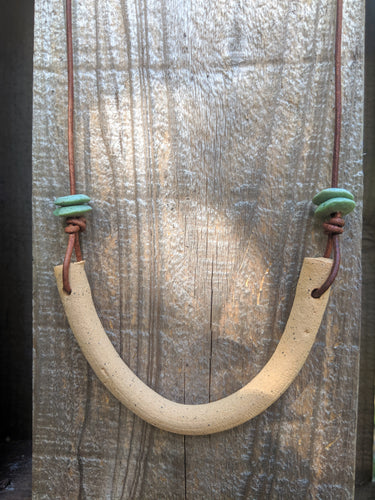 Speckled Curve with Glass Necklace