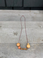 Load image into Gallery viewer, Orange+ Wood Swirl Necklace
